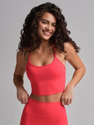 ComfrtCore™ Strappy Crop Tank: Izabella is 5'5" and wears a size XS