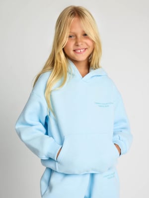 Pastel Kids Hoodie: Arina is 9 wearing a size S