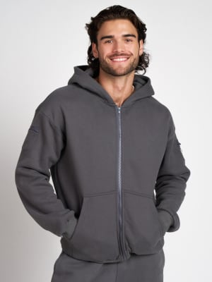 Travel Essentials Zip Hoodie: Hunter is 6'4" and wears a size L