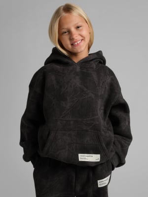 Camo Kids Hoodie: Arina is 9, 54" tall, wearing size S