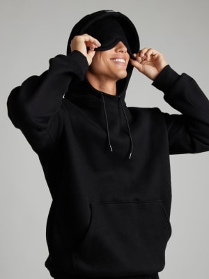 Airplane Mode Travel Hoodie: Evan is 6′4″ wearing a size L