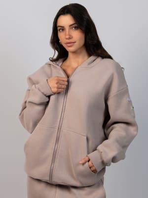Travel Essentials Zip Hoodie: Abby is 5'9" and wears a size M