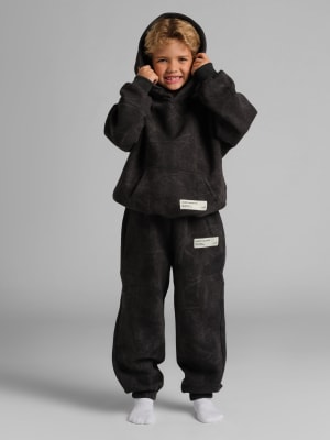 Camo Kids Sweatpants: Joseph is 6, 50” tall, wearing size S