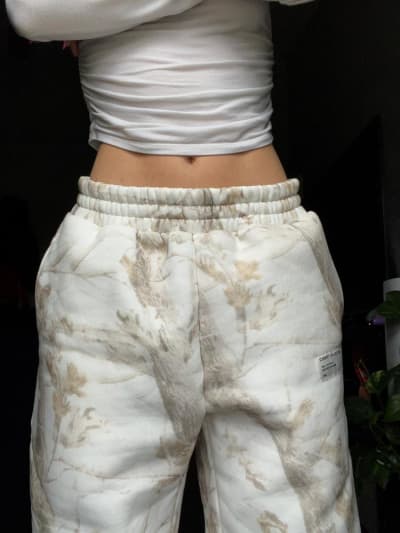 Em